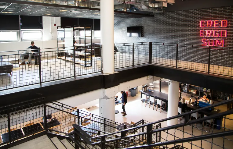 Open-plan newsroom floor inside the Foundry