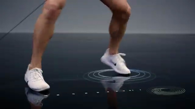 Rotational footwork drill visualized on the Tonal studio floor