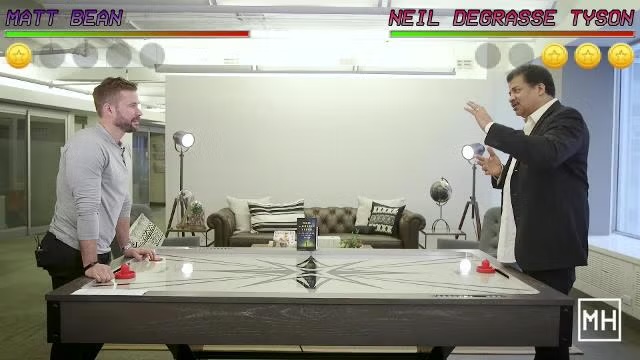 Branded video game-style graphic of Matt Bean versus Neil deGrasse Tyson