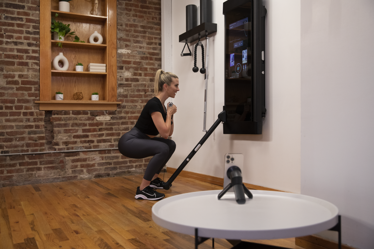 Tonal member set up with a phone tripod for a Smart View-tracked squat